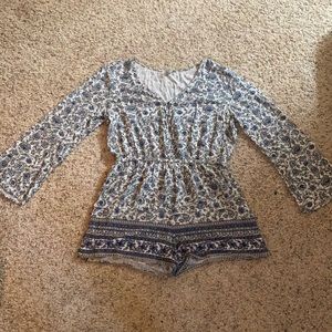 Blue and white floral long-sleeve romper